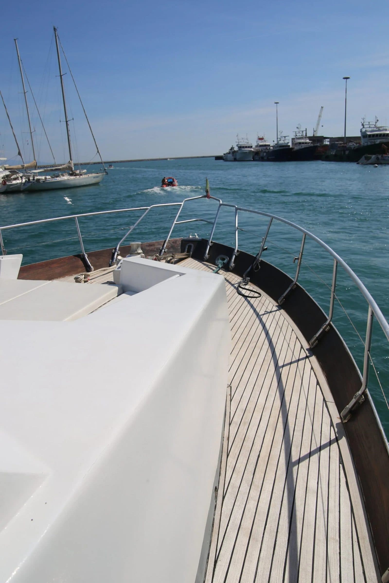 The teak side deck leading to the bow