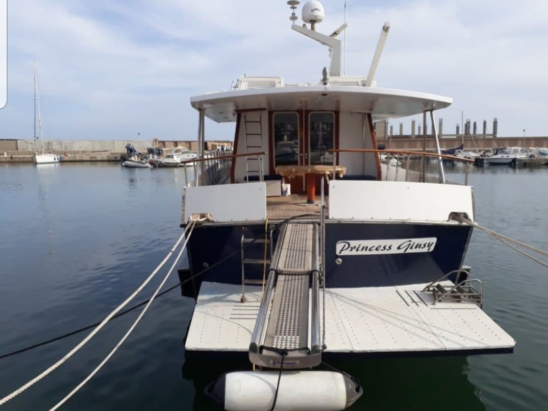The stern of Princess Giusy with her name and the boarding gangway